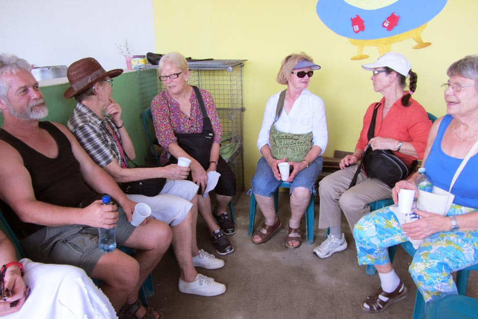 Volunteer group sitting inside